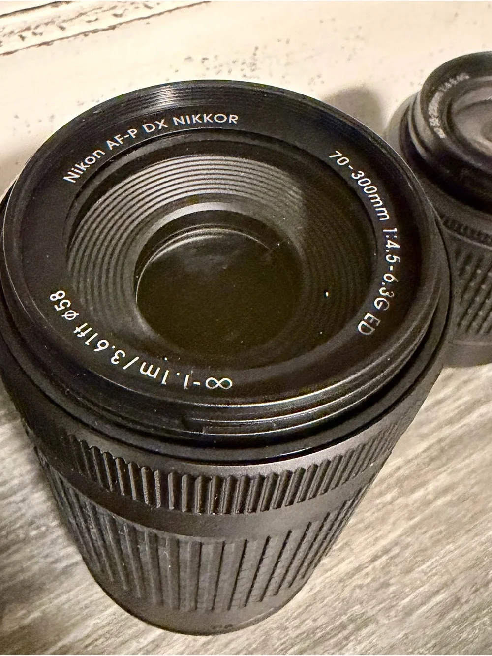 Nikon Camera Kit with Black Lenses and Red Strap